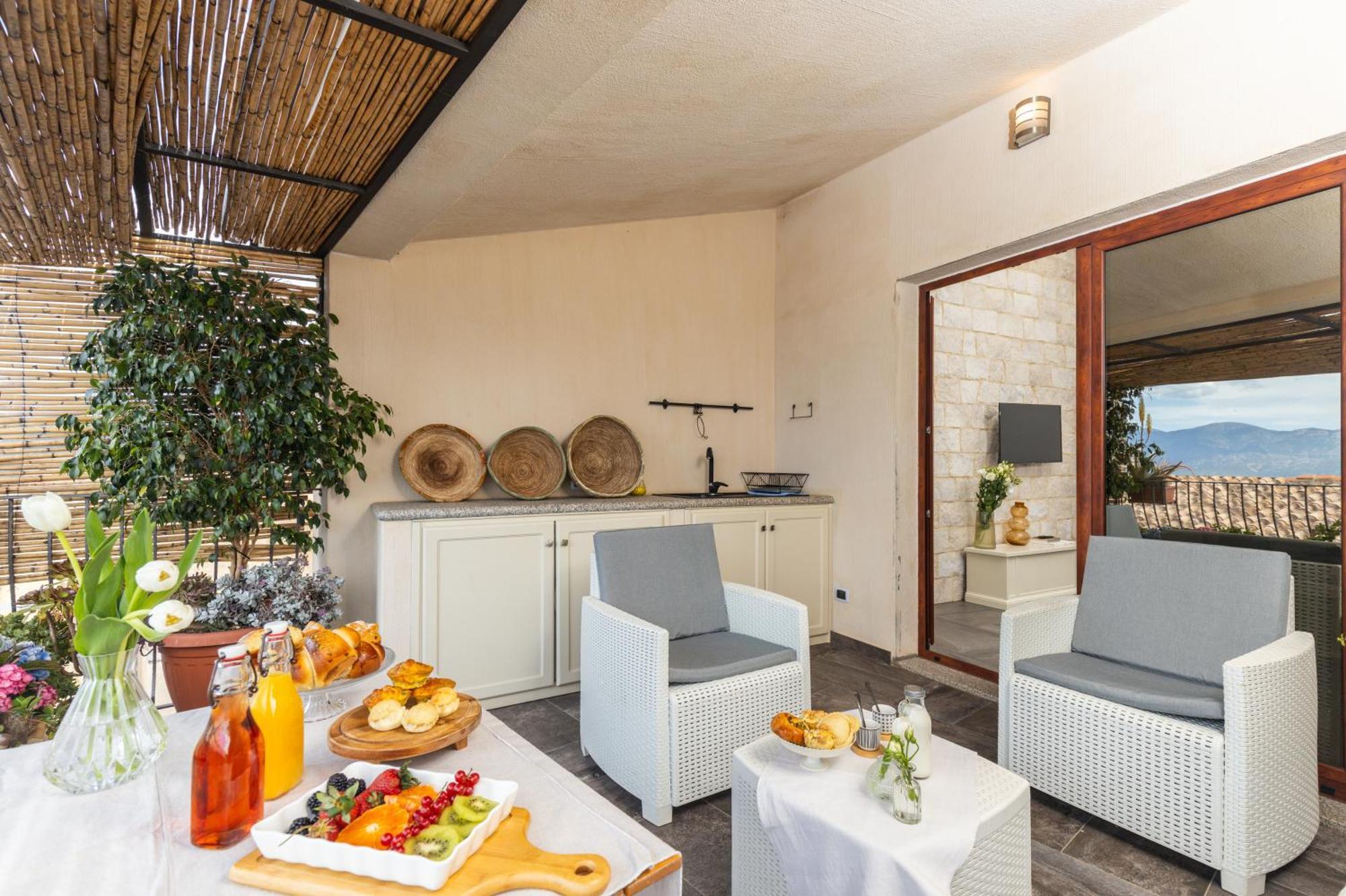 Loft Rooms I Cinque Mori Baunei Bagian luar foto